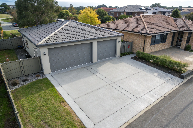 Proper base preparation and excavation for garage slab construction in Newcastle showing compacted base and formwork